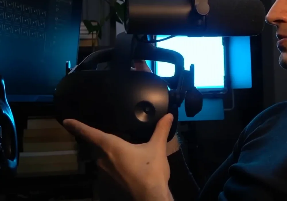 An HP Reverb G2 VR headset held in the hands in front of the rig, the headset behind the facial interface entry in this sim racing accessories list.