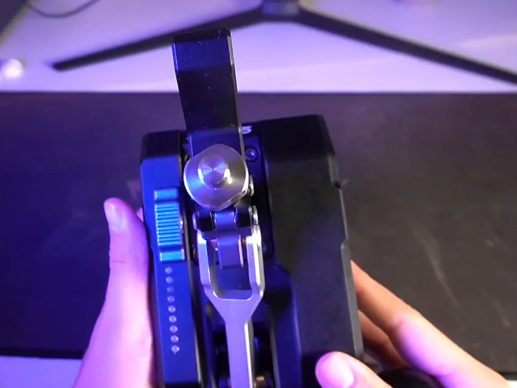 Conspit CHS seen from above with the knob removed, showing the row of small LEDs along the edge of the base, in line with the ribbed mode slider