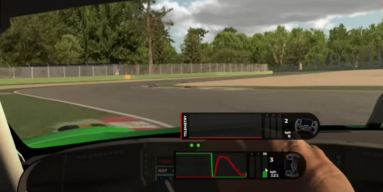 Imola Turn 1 from the cockpit in a paused track guide, the black anti-curb beside the green kerb and a brake trace fading out as the throttle rises, the throttle reference used for trail braking in sim racing.
