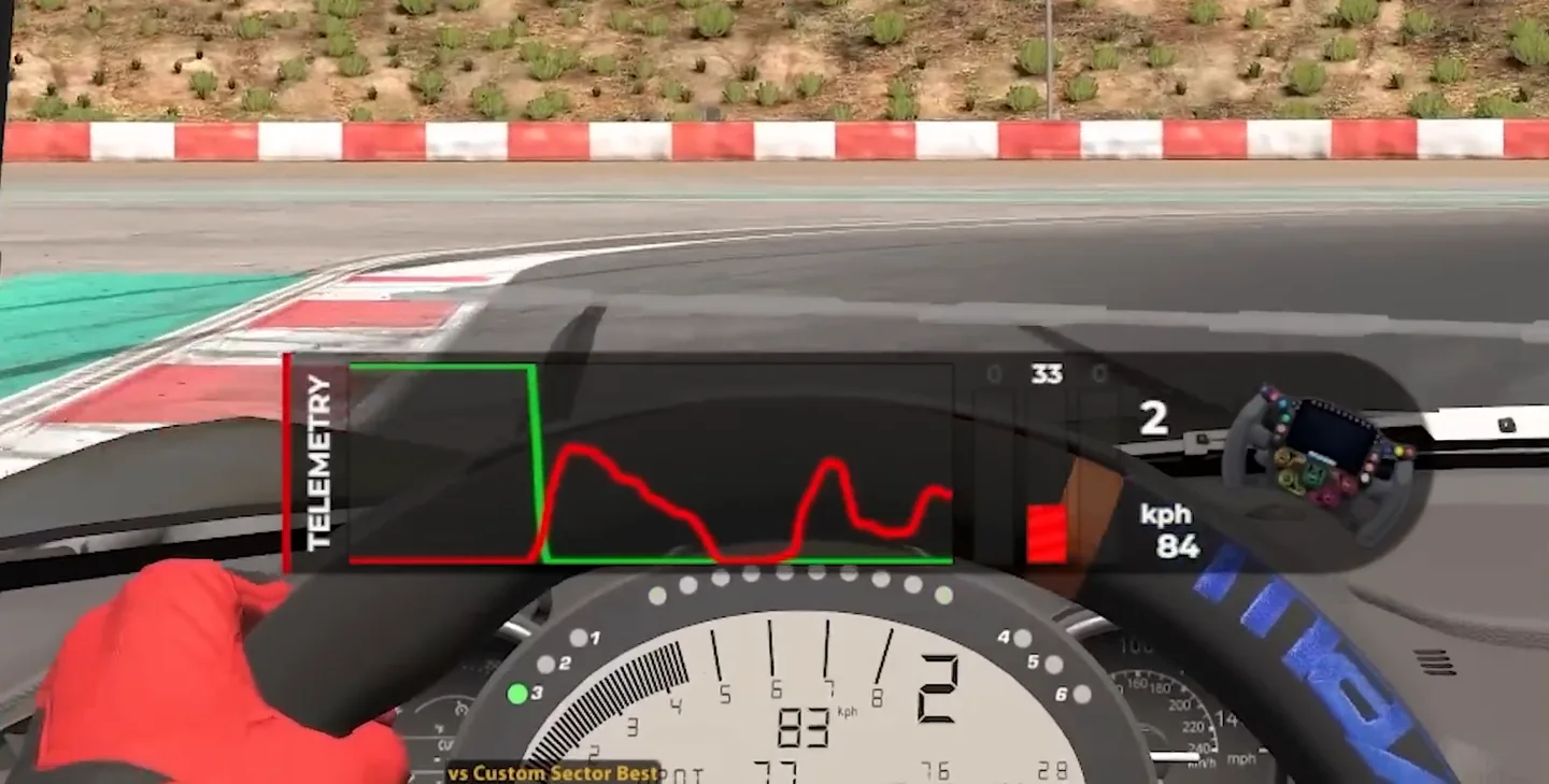 Large telemetry overlay in a cockpit where the red brake trace falls away mid-corner and then rises again, the release-and-reapply used when trail braking in sim racing would over-rotate the car.