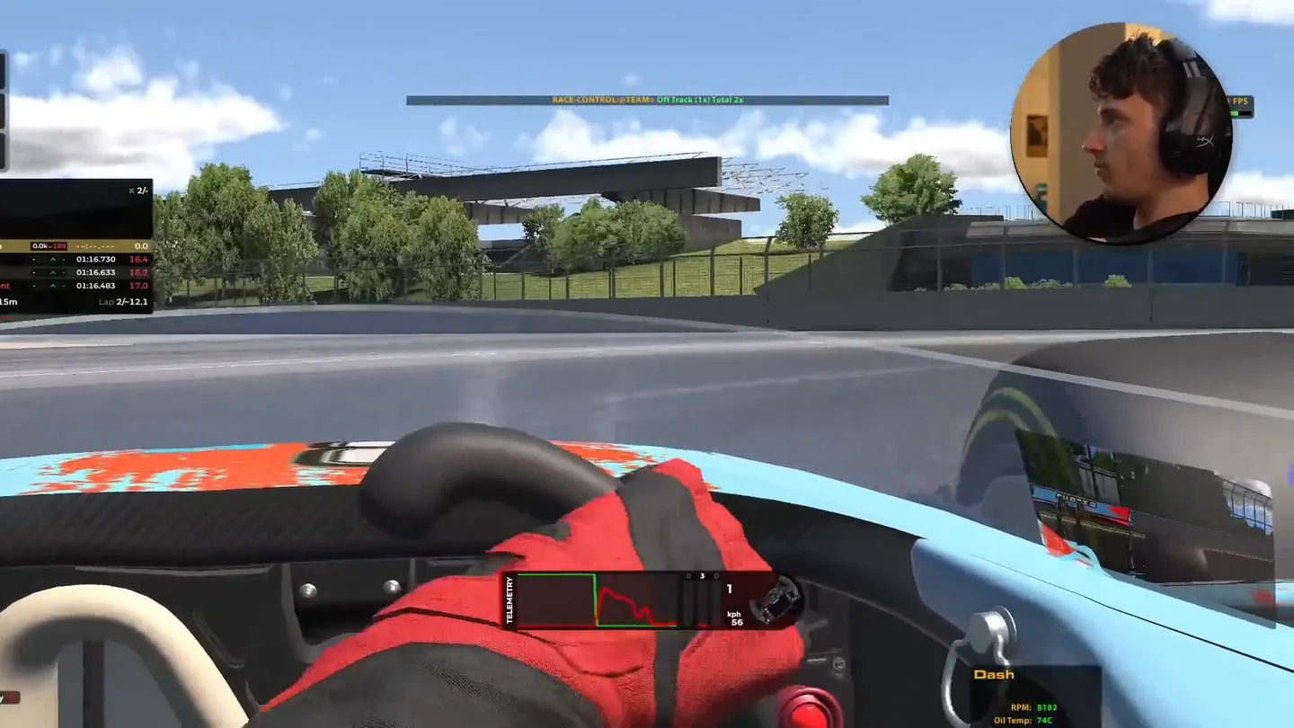 Open-wheel cockpit in iRacing with the view swung to the right toward the grandstand, showing that sim racing head tracking moves the camera without widening it.