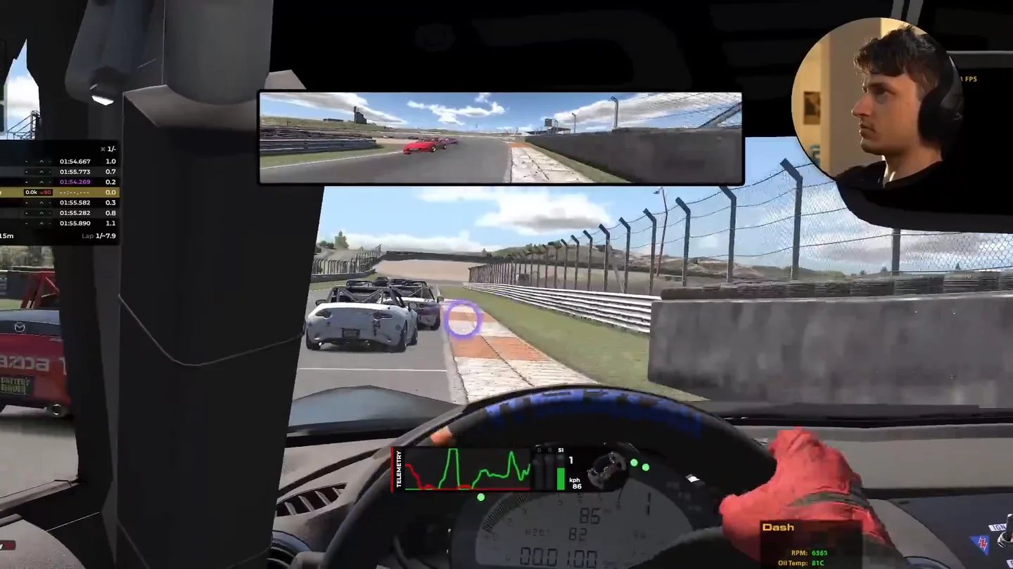 Mazda MX-5 cockpit view in iRacing turned hard left toward a pack of cars, showing that sim racing head tracking gives one side of the car at a time.